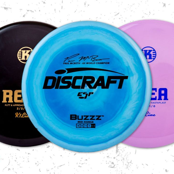 A selection of three disc golf disc types