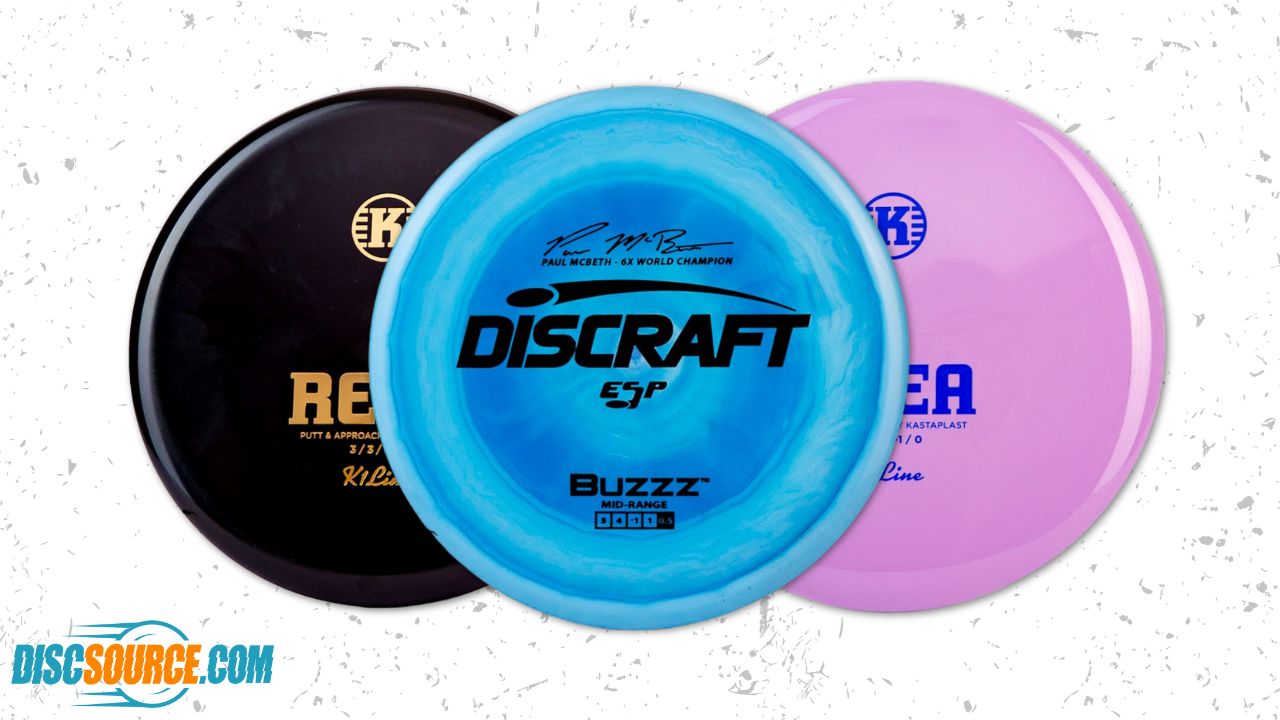 A selection of three disc golf disc types