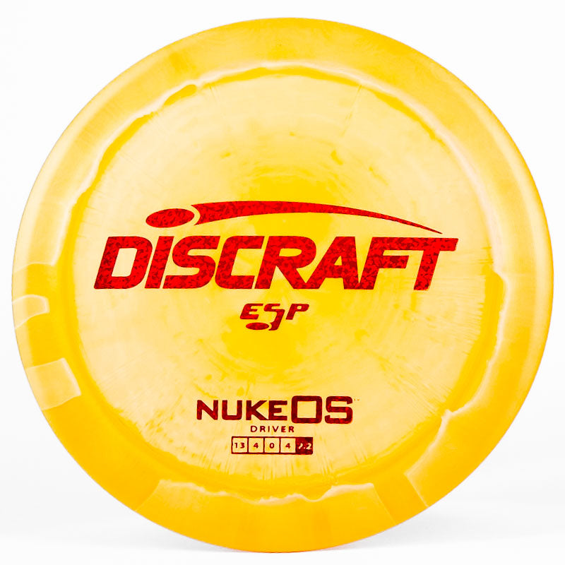 A yellow-ish Discraft Nuke OS
