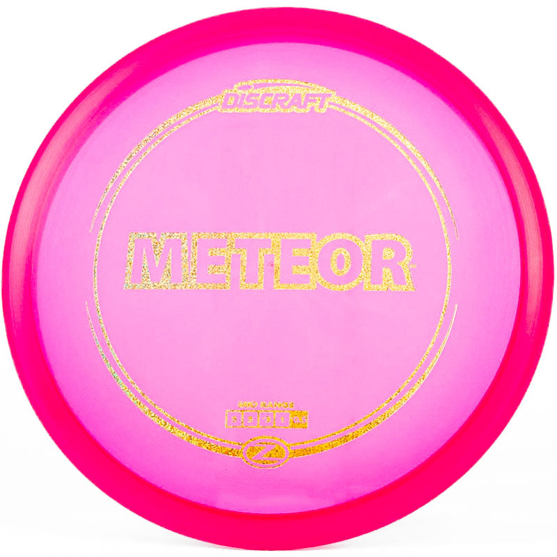A Discraft Meteor disc photographed on a white background