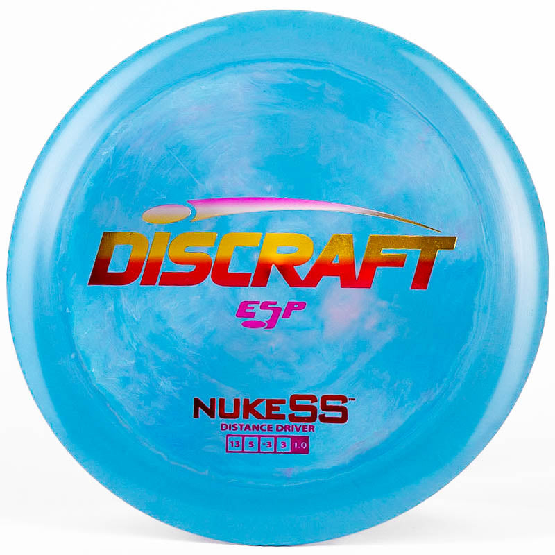 A blue Discraft Nuke SS distance driver on a white background