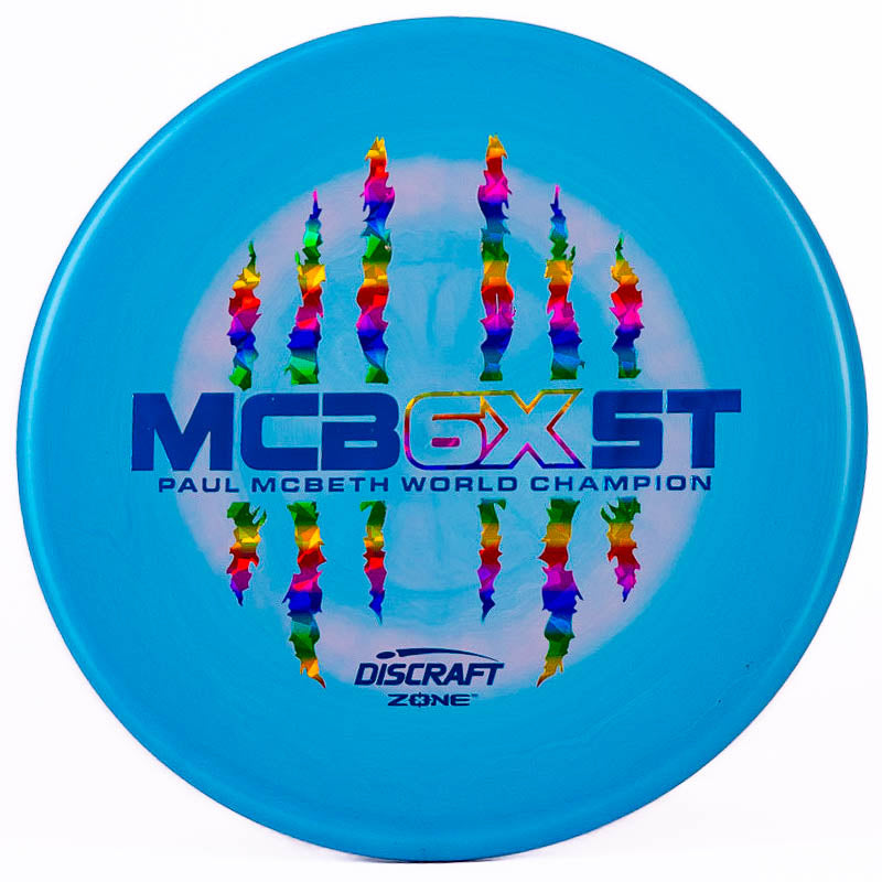 A blue and pink Discraft Zone with a Paul McBeth stamp